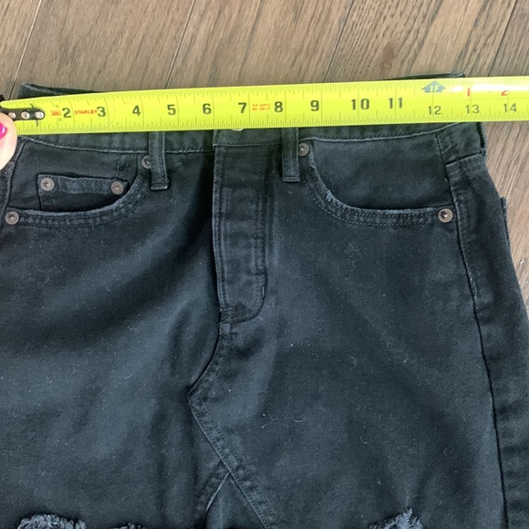 Black denim mini skirt. Button fly - Picture 5 of 5